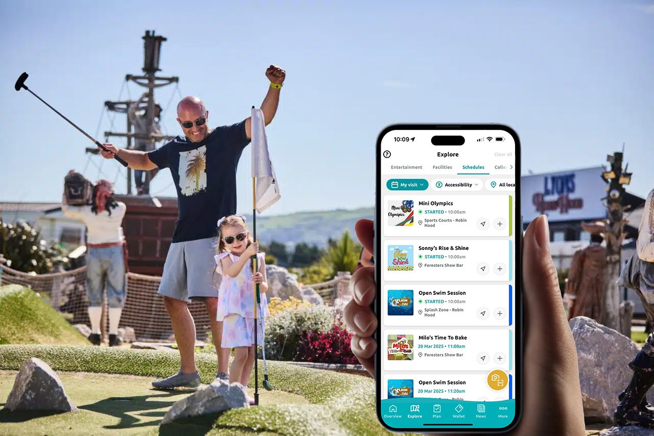 Image of family playing crazy golf and using mobile app to look at activities.